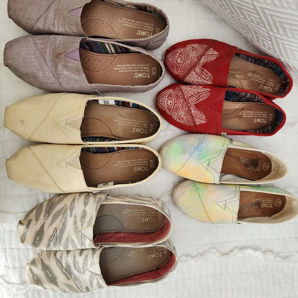 5 pairs of Tom's shoes in good condition.